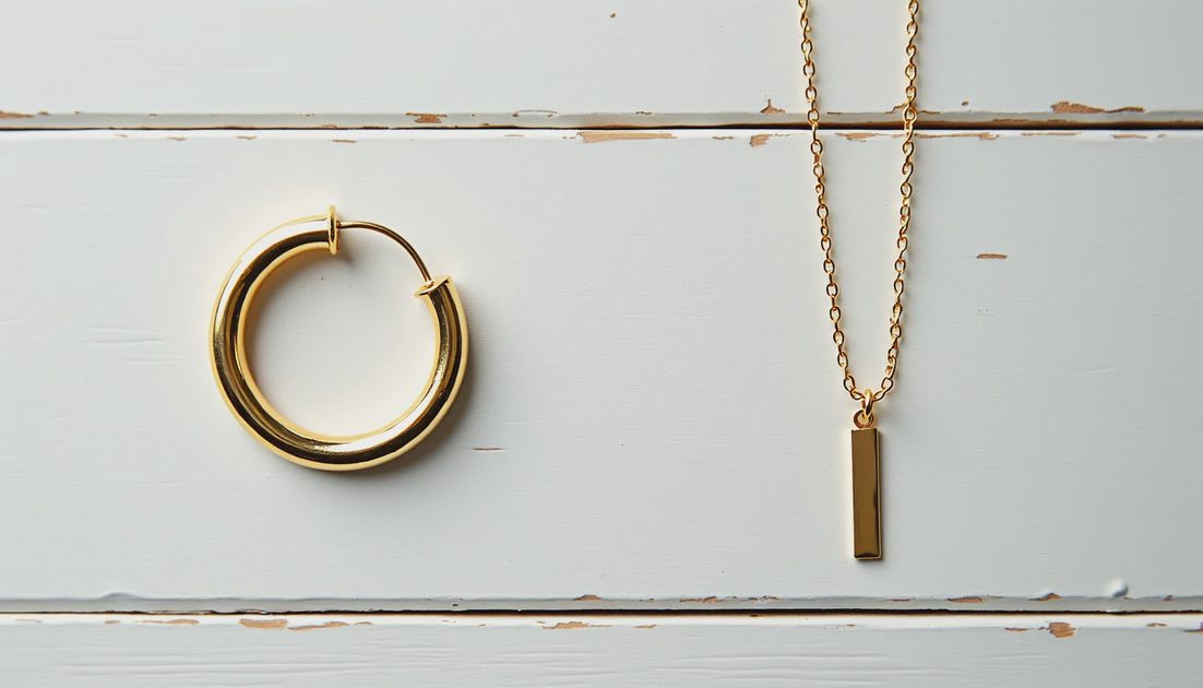 Earrings First, Necklaces Second Bold hoop earrings beside a tiny dainty necklace showing why earrings work better for plus size.